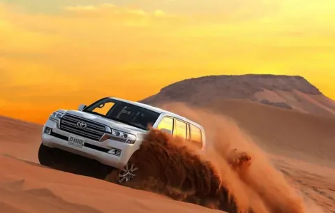 Evening Desert Safari with BBQ Dinner, Fire Show & Belly Dance